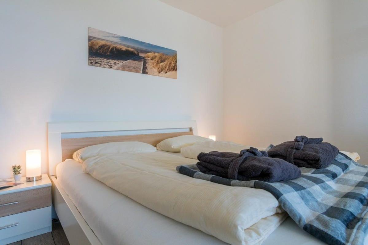Ferienwohnung Sandkueste Mit Strandkorb & Indoor Spielplatz ハイリゲンハーフェン エクステリア 写真